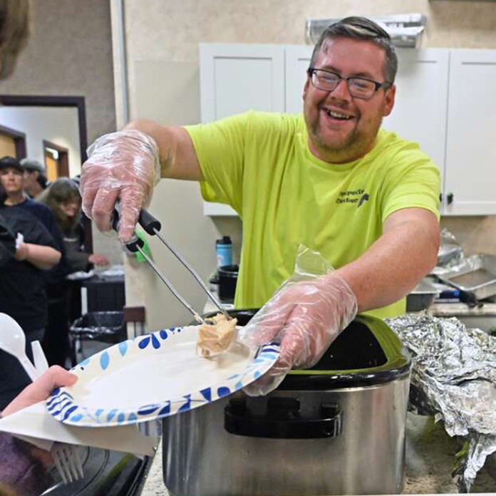 Smiling man cooking